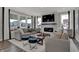Open concept living room with stylish furnishings and a cozy fireplace at 15360 Cardonia Rd, Fishers, IN 46037