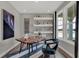 Bright study room with a wooden desk, comfortable chair, and decorative shelves at 15360 Cardonia Rd, Fishers, IN 46037
