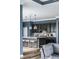 Gourmet kitchen with stainless steel appliances, a large island, and pendant lighting at 15596 Edenvale Dr, Westfield, IN 46074