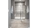 Shower with tile surround, built in bench, and glass door in a modern bathroom at 15596 Edenvale Dr, Westfield, IN 46074