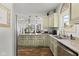 Spacious kitchen with granite counters, stainless steel appliances, and ample storage at 170 W Broadway St, Greenwood, IN 46142