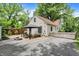 Inviting backyard with an outdoor seating area, fire pit, and well-maintained landscaping at 1725 W 53Rd St, Indianapolis, IN 46228