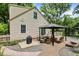 Charming outdoor area with a gazebo-covered seating and a barbecue grill at 1725 W 53Rd St, Indianapolis, IN 46228