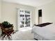 Bedroom featuring sliding glass door leading to backyard and a walk-in closet at 1725 W 53Rd St, Indianapolis, IN 46228