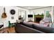 Living room features an open floor plan, hardwood floors, and fun decor at 1725 W 53Rd St, Indianapolis, IN 46228