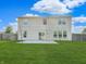 View of backyard with patio and open lawn at 1843 Winchester Blvd, Avon, IN 46123