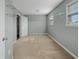 Bedroom with neutral paint, carpet flooring, and closet with wire shelving at 1843 Winchester Blvd, Avon, IN 46123