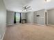 Bedroom featuring a ceiling fan, window with curtains and neutral paint at 1843 Winchester Blvd, Avon, IN 46123
