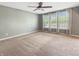 Bedroom featuring large windows, neutral paint, and ceiling fan at 1843 Winchester Blvd, Avon, IN 46123
