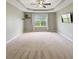Bedroom featuring trey ceilings, a ceiling fan and a large window at 1843 Winchester Blvd, Avon, IN 46123