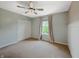 Bedroom featuring closet and window with pink curtain and fan at 1843 Winchester Blvd, Avon, IN 46123