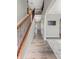 Inviting entryway featuring hardwood floors, wrought iron staircase, and arched doorways at 1843 Winchester Blvd, Avon, IN 46123