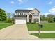 Beautiful two-story home with a spacious front yard and a long driveway at 1843 Winchester Blvd, Avon, IN 46123