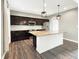Well-equipped kitchen featuring a center island, granite countertops and stainless appliances at 1843 Winchester Blvd, Avon, IN 46123