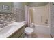 Neutral bathroom with a combination tub and shower at 1858 Broadleaf Ct, Greenwood, IN 46143