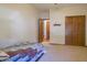 Cozy bedroom featuring neutral carpet with double door closet at 1858 Broadleaf Ct, Greenwood, IN 46143