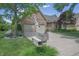 Traditional brick home with a well-maintained lawn, a two car garage and mature trees providing curb appeal at 1858 Broadleaf Ct, Greenwood, IN 46143