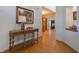 Inviting foyer with hardwood floors and an antique table at 1858 Broadleaf Ct, Greenwood, IN 46143