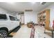 Garage with car and ample storage space at 1858 Broadleaf Ct, Greenwood, IN 46143