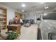 Spacious garage with vehicle, storage shelving, and garage door openers at 1858 Broadleaf Ct, Greenwood, IN 46143