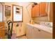 Cozy laundry room with washer, dryer, and storage cabinets at 1858 Broadleaf Ct, Greenwood, IN 46143
