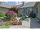 Inviting backyard patio featuring outdoor seating, beautiful landscaping, and a serene atmosphere perfect for relaxation at 1858 Broadleaf Ct, Greenwood, IN 46143