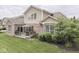 Charming backyard with a deck, landscaped yard, and a well-maintained lawn at 187 N Bend Dr, Greenwood, IN 46142