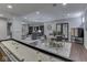 Large finished basement featuring a game room, dining area and a cozy living room with built-in bookshelves at 187 N Bend Dr, Greenwood, IN 46142