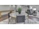 Finished basement featuring a dining area and comfortable sitting area with a large sofa at 187 N Bend Dr, Greenwood, IN 46142