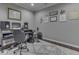 The basement features a music room with a computer, speakers, and a keyboard at 187 N Bend Dr, Greenwood, IN 46142