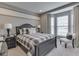 Neutral bedroom with modern furniture and bay window offering lots of natural light at 187 N Bend Dr, Greenwood, IN 46142