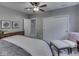 Inviting bedroom featuring a ceiling fan, comfortable seating area, and artwork at 187 N Bend Dr, Greenwood, IN 46142