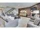 Open-concept living room with fireplace, staircase, comfortable seating, and stylish decor at 187 N Bend Dr, Greenwood, IN 46142
