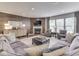 Spacious living room with fireplace, wood accent wall, neutral decor, and ample seating at 187 N Bend Dr, Greenwood, IN 46142
