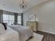 Comfortable main bedroom featuring neutral tones, soft lighting, and a bay window at 187 N Bend Dr, Greenwood, IN 46142