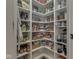 Spacious walk-in pantry with ample shelving, offering plenty of storage space for food and supplies at 187 N Bend Dr, Greenwood, IN 46142