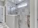 Modern shower with gray tile, glass surround, and dual shower heads and sprayers at 187 N Bend Dr, Greenwood, IN 46142