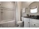 Clean bathroom with a shower-tub combination, white tiles, and a modern vanity at 1894 Rhettsbury St, Carmel, IN 46032