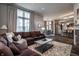Spacious living room with a view into dining area and kitchen at 1894 Rhettsbury St, Carmel, IN 46032