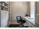 Bright office features a modern chair, white built-in shelves, and elegant white desk at 1894 Rhettsbury St, Carmel, IN 46032