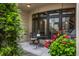 Quaint outdoor seating area with wrought iron table, perfect for enjoying the landscaped surroundings at 1894 Rhettsbury St, Carmel, IN 46032