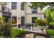 A tranquil patio with decorative potted plants and lush greenery provides a serene outdoor escape at 1894 Rhettsbury St, Carmel, IN 46032