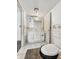 Compact bathroom featuring a vanity with mirror, toilet, and tiled walls, ready for remodeling at 1947 N Parker Ave, Indianapolis, IN 46218