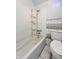 Bathroom with older fixtures including a tub, shower and toilet needing repair at 1947 N Parker Ave, Indianapolis, IN 46218