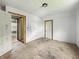 Bedroom featuring bright, neutral walls, and an open doorway, awaiting personalization at 1947 N Parker Ave, Indianapolis, IN 46218