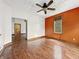 Spacious living room featuring hardwood floors and ample natural light at 1947 N Parker Ave, Indianapolis, IN 46218