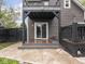 Backyard with sliding glass doors opening onto a small deck that flows into the patio at 2222 Pleasant St, Indianapolis, IN 46203