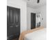 Bright bedroom with a large closet, a view of the living room and wood flooring at 2222 Pleasant St, Indianapolis, IN 46203