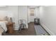 This is a bedroom that features a gray exercise mat, a metal chair and small black table at 2222 Pleasant St, Indianapolis, IN 46203
