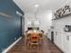 Dining room with bar area, including wine refrigerator, and stylish decor at 2222 Pleasant St, Indianapolis, IN 46203